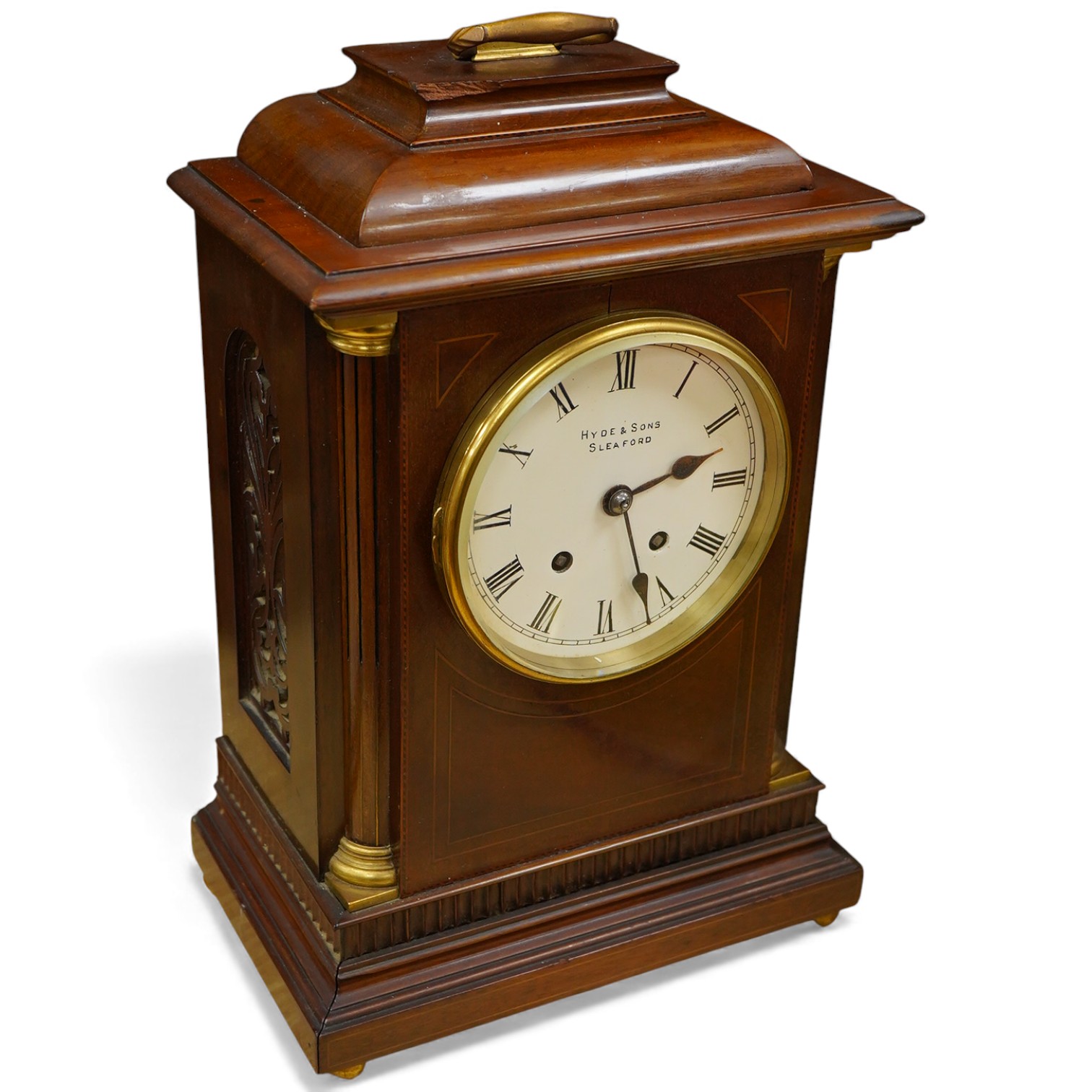 An early 20th century mahogany mantel clock, the dial inscribed Hyde & Sons, Sleaford, 41cm high